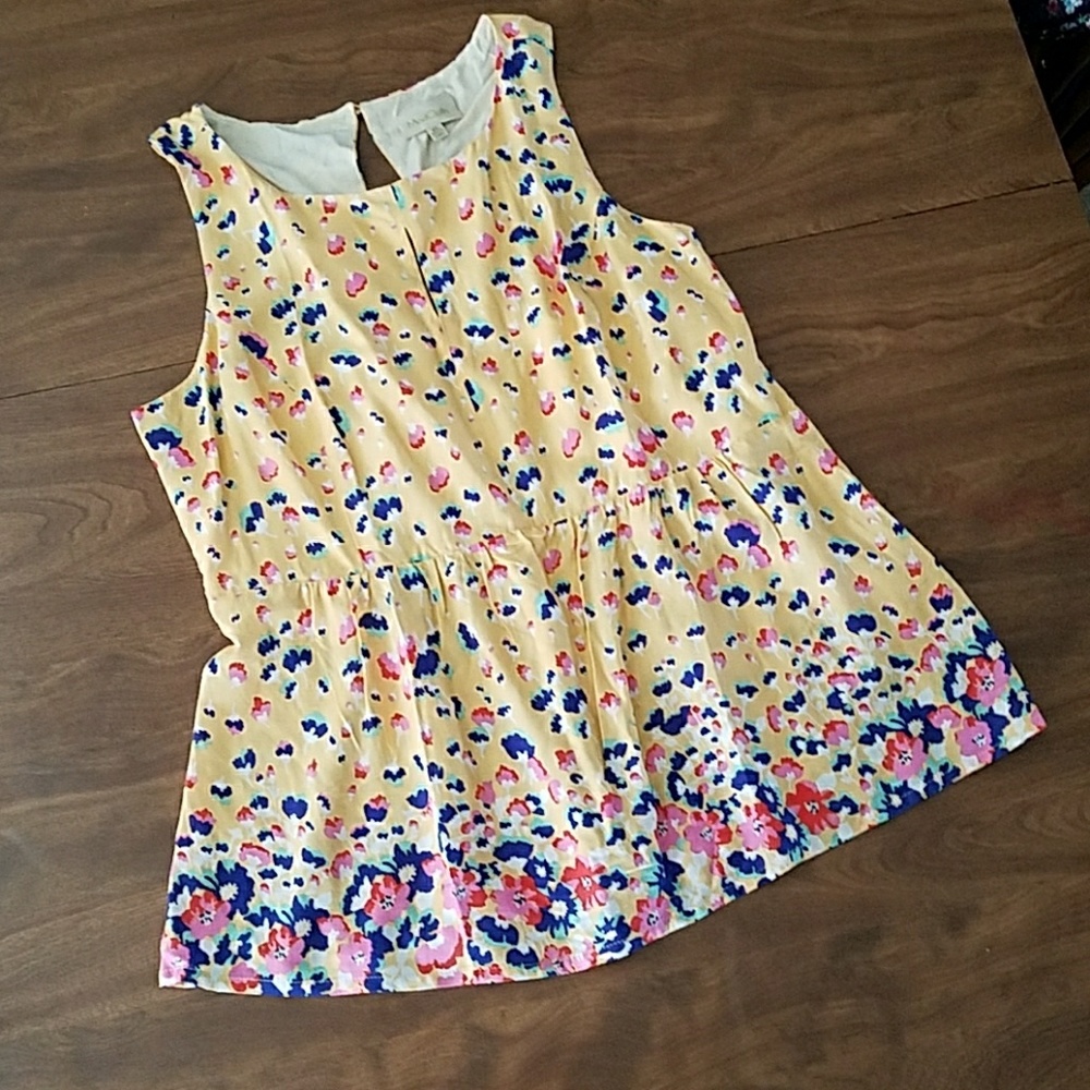 NWOT Modcloth sleeveless T back peplum blouse